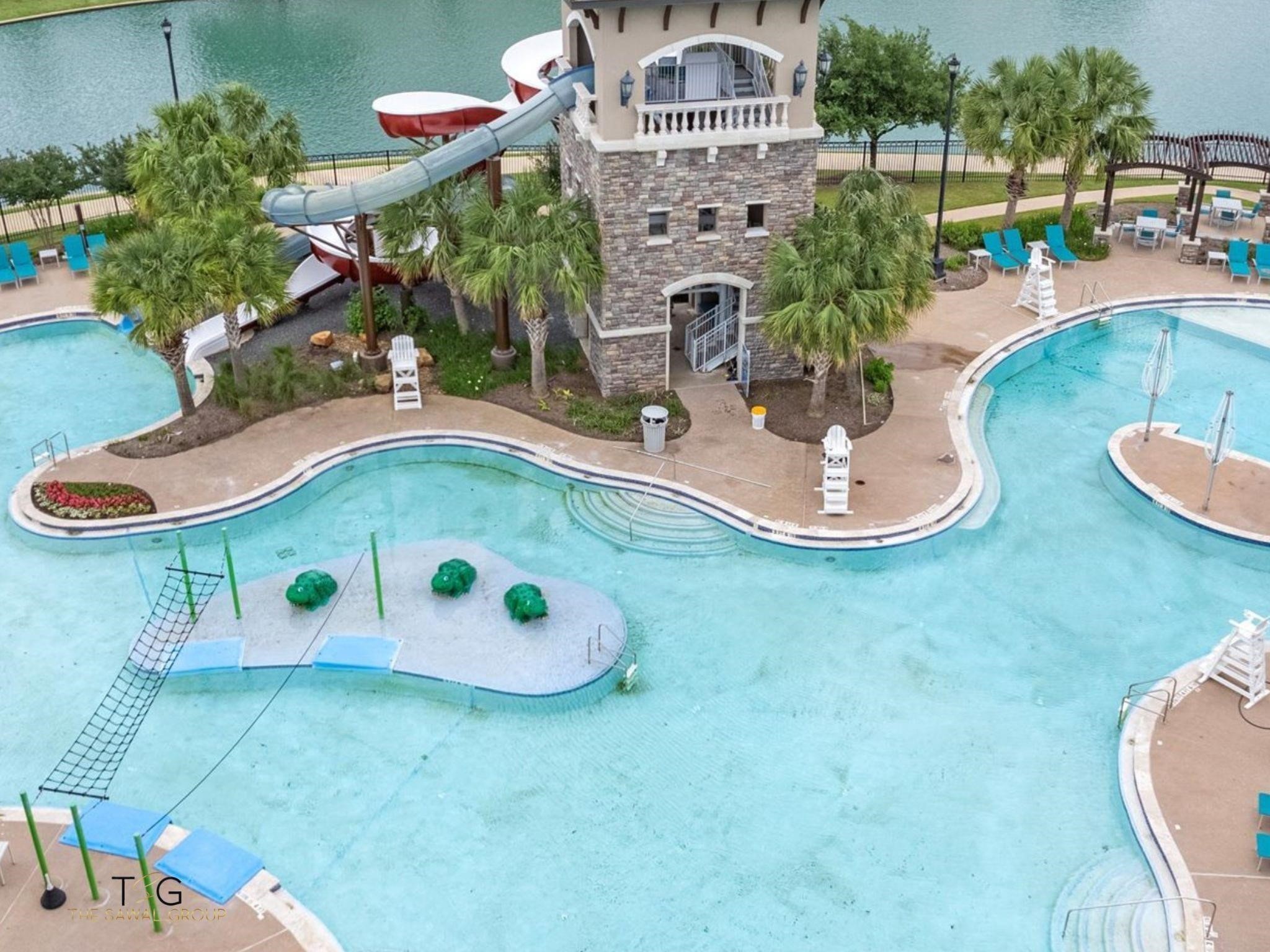 5403 Rouchel Brook Lane Sugar Land, TX 77479 - Photo 37 of 42 Riverstone offers resort like amenities. Check out this resort style pool. Perfect for a staycation!