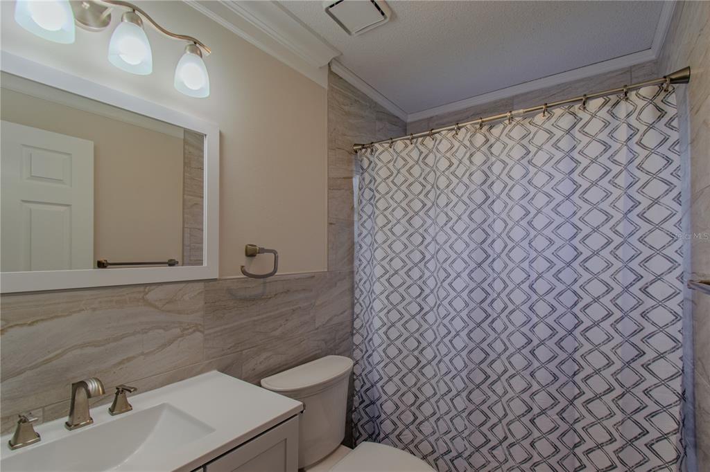 24024 Deer Road Astor, FL 32102 - Photo 13 of 22 a bathroom with a toilet and a sink