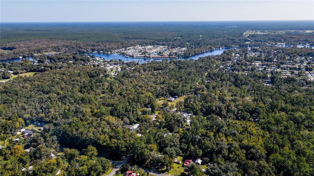 24024 Deer Road Astor, FL 32102 - Photo 22 of 22 an aerial view of multiple house