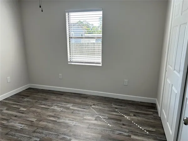 a bathroom with a toilet and a bathtub