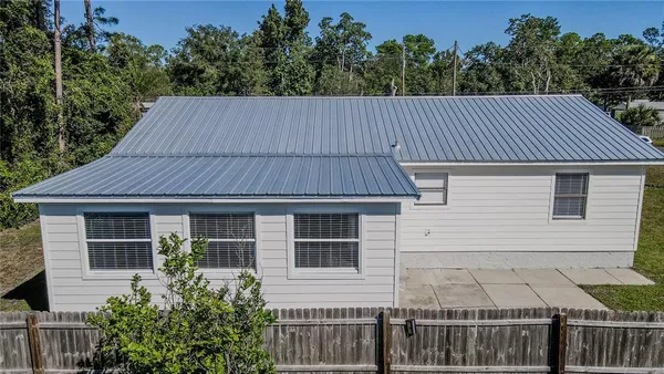 a house view with a garden space