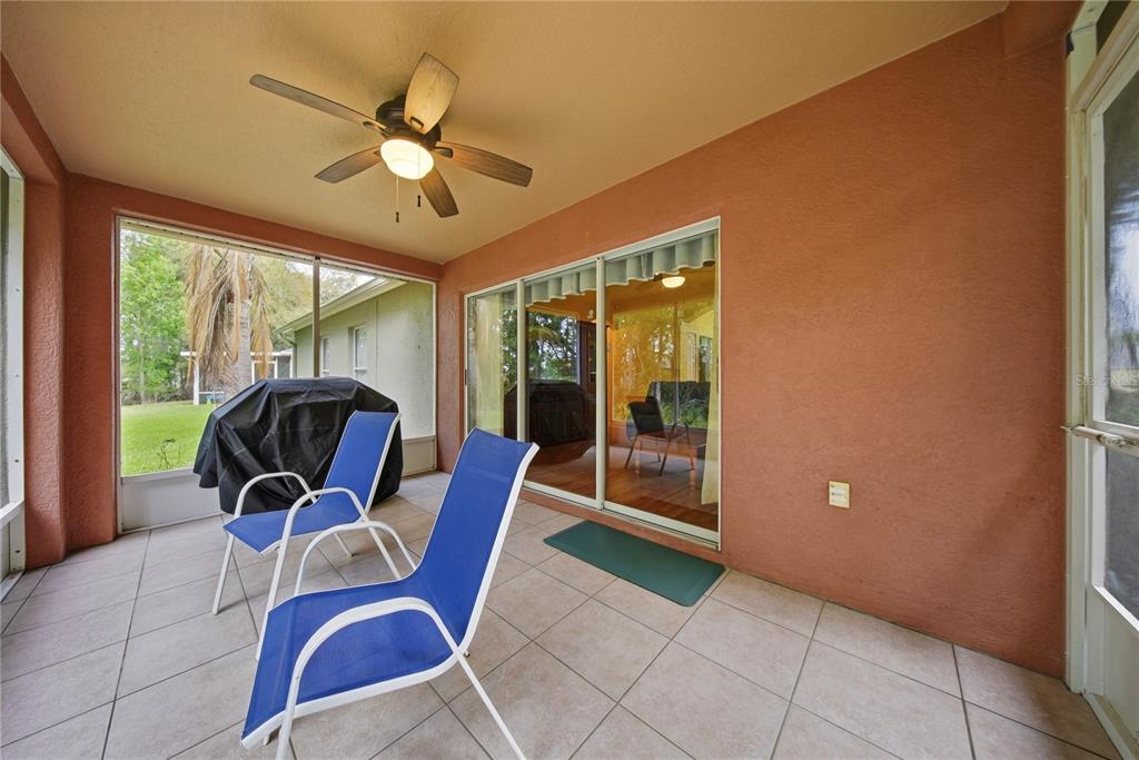 5856 Count Turf Lane Wesley Chapel, FL 33544 - Photo 21 of 57 a view of a livingroom with furniture