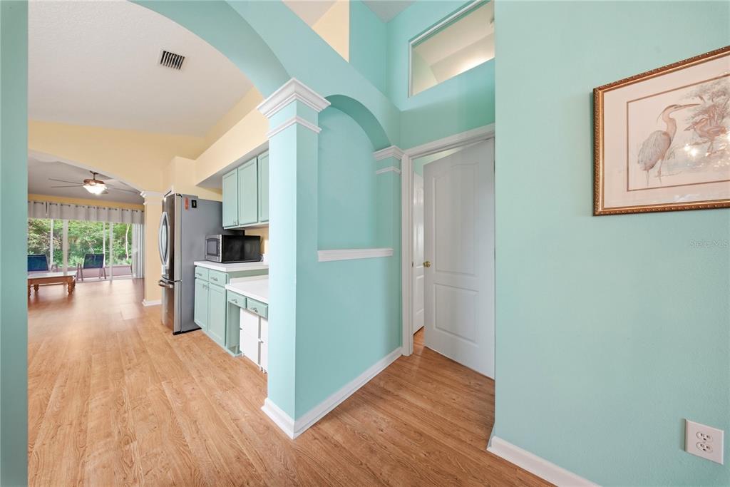 5856 Count Turf Lane Wesley Chapel, FL 33544 - Photo 28 of 57 a view interior of the house with wooden floor