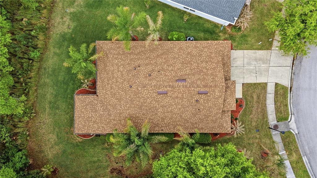 5856 Count Turf Lane Wesley Chapel, FL 33544 - Photo 9 of 57 an aerial view of a house