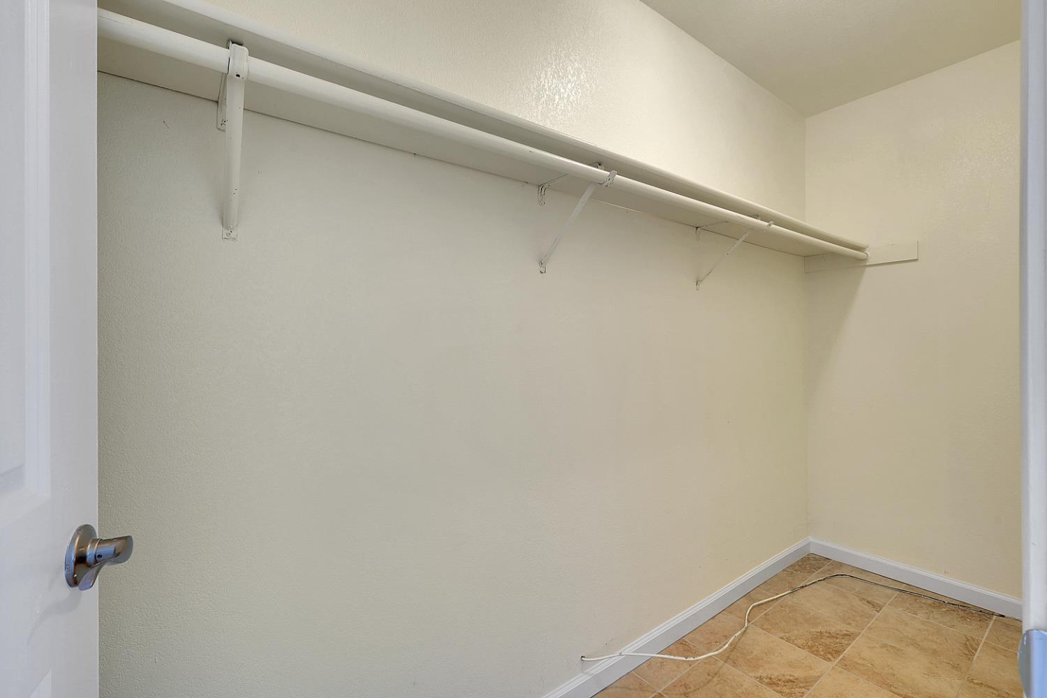 4294 Lever Avenue Olivehurst, CA 95961 - Photo 26 of 32 a view of a room with shelf on the wall