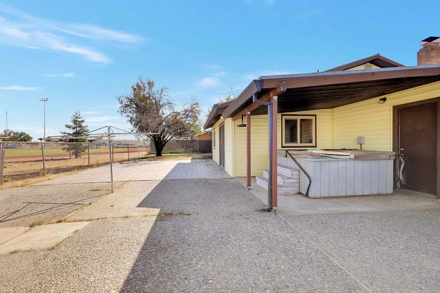 4294 Lever Avenue Olivehurst, CA 95961 - Photo 28 of 32 a view of a house with a sink and wooden fence