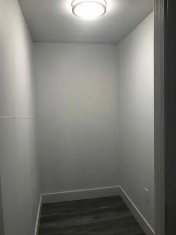 a kitchen with appliances cabinets and a sink