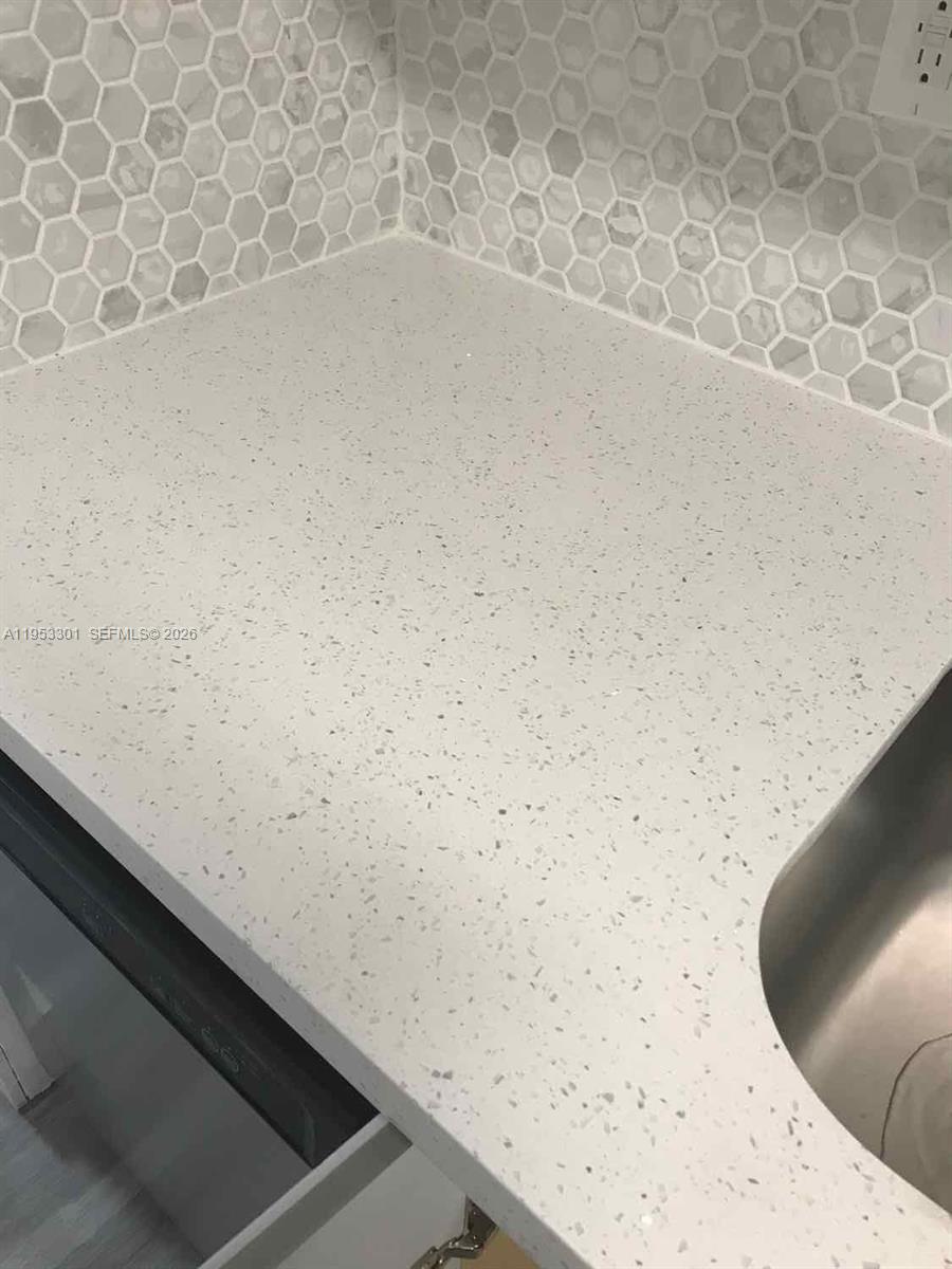 1920 Rutland Street Opa-Locka, FL 33054 - Photo 29 of 33 a view of a bathtub in a bathroom