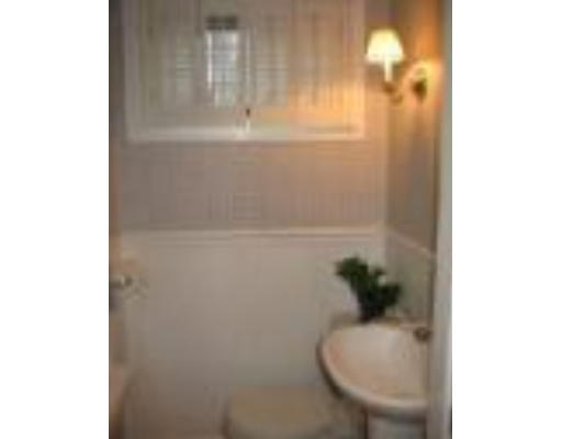 18 Homestead Road Marblehead, MA 01945 - Photo 12 of 15 a bathroom with a sink and a mirror