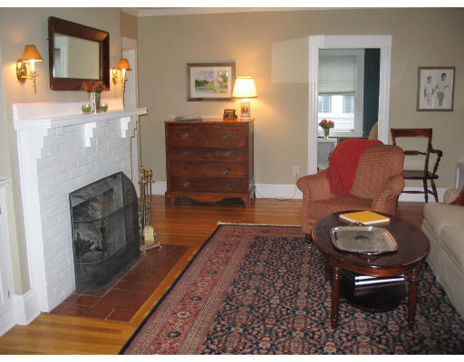 18 Homestead Road Marblehead, MA 01945 - Photo 2 of 15 a living room with furniture and a fireplace