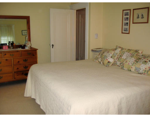 18 Homestead Road Marblehead, MA 01945 - Photo 5 of 15 a bedroom with a bed and a dresser