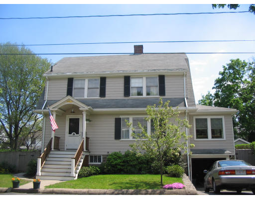 18 Homestead Road Marblehead, MA 01945 - Photo 10 of 15 a front view of a house with garden