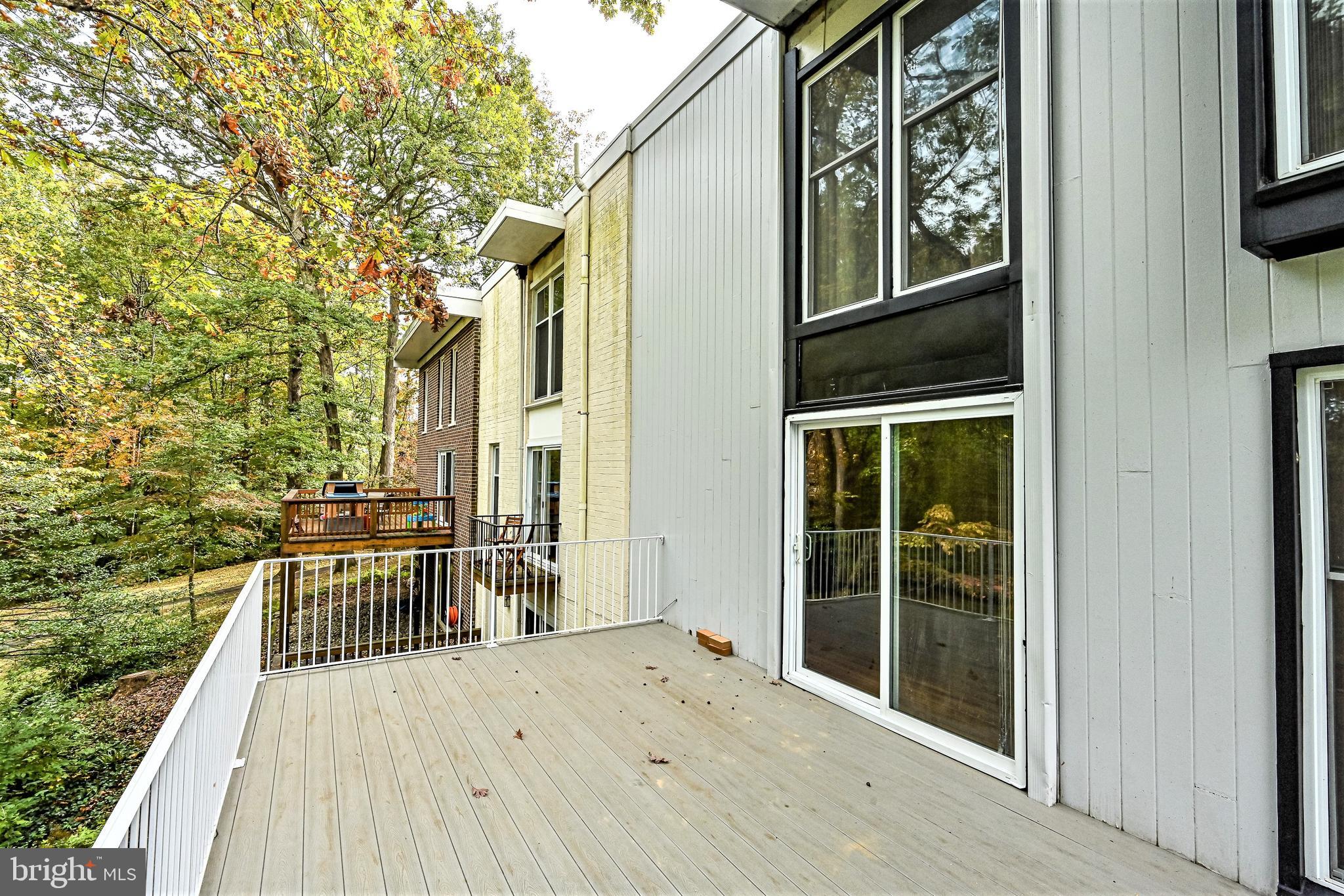 1664 Wainwright Drive Reston, VA 20190 - Photo 36 of 41 Main Level Deck: House Backs to Full Wooded Area