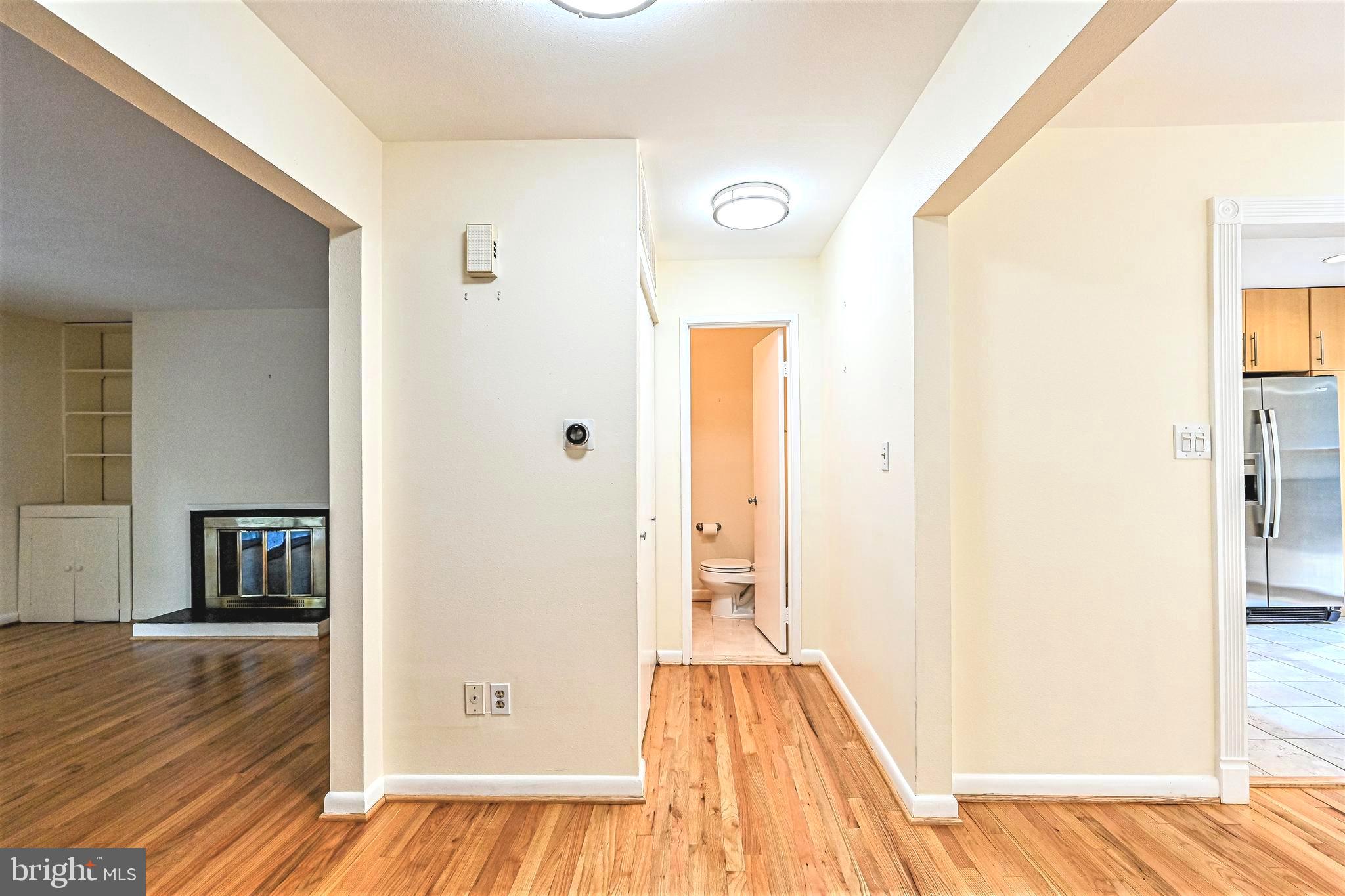 1664 Wainwright Drive Reston, VA 20190 - Photo 8 of 41 Main Level Hallway between DR and LR