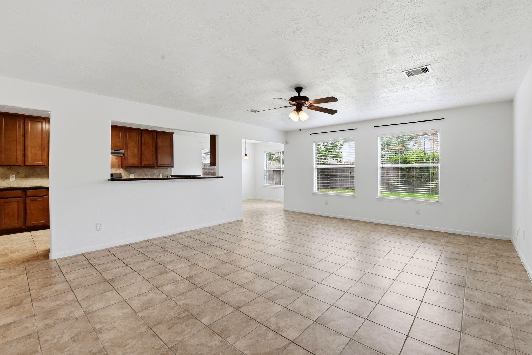 22102 Bridgestone Crossing Drive Spring, TX 77388 - Photo 13 of 38 a view of an empty room with a window
