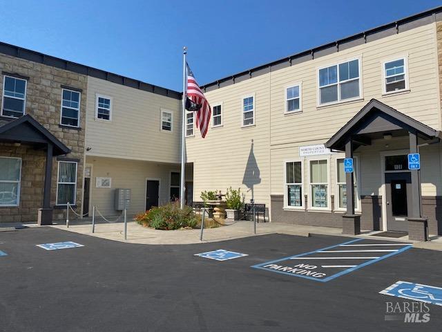 a front view of a house with yard