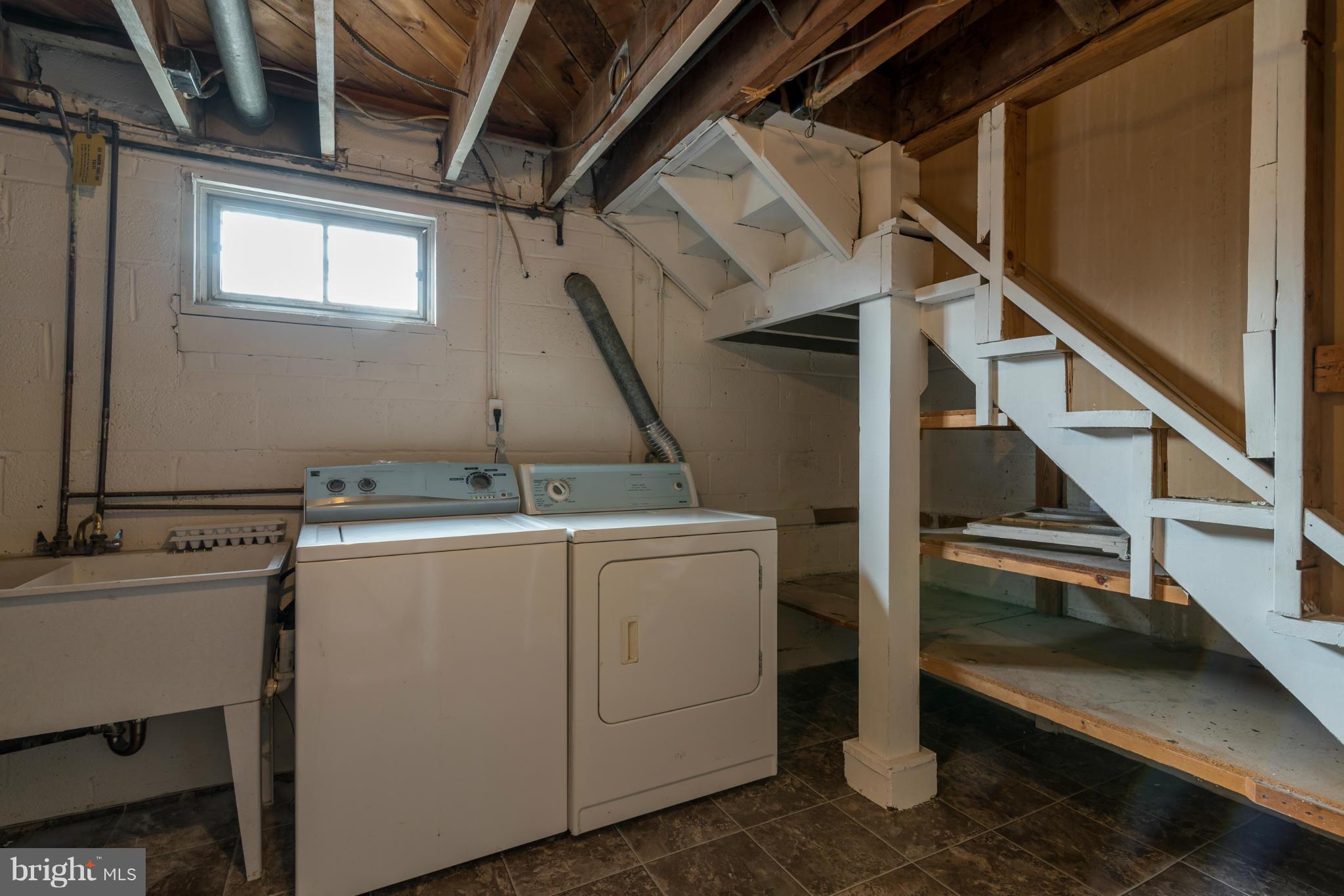 3310 Harrell Street Silver Spring, MD 20906 - Photo 22 of 26 a utility room with dryer and washer
