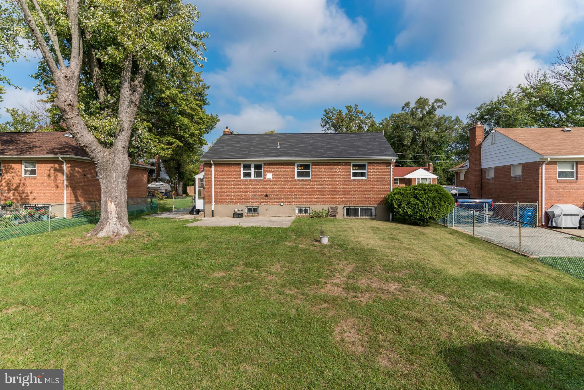 3310 Harrell Street Silver Spring, MD 20906 - Photo 24 of 26 a front view of a house with garden