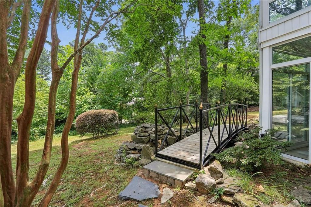 5622 Williamsburg Drive Northwest Norcross, GA 30093 - Photo 11 of 29 a view of backyard from deck