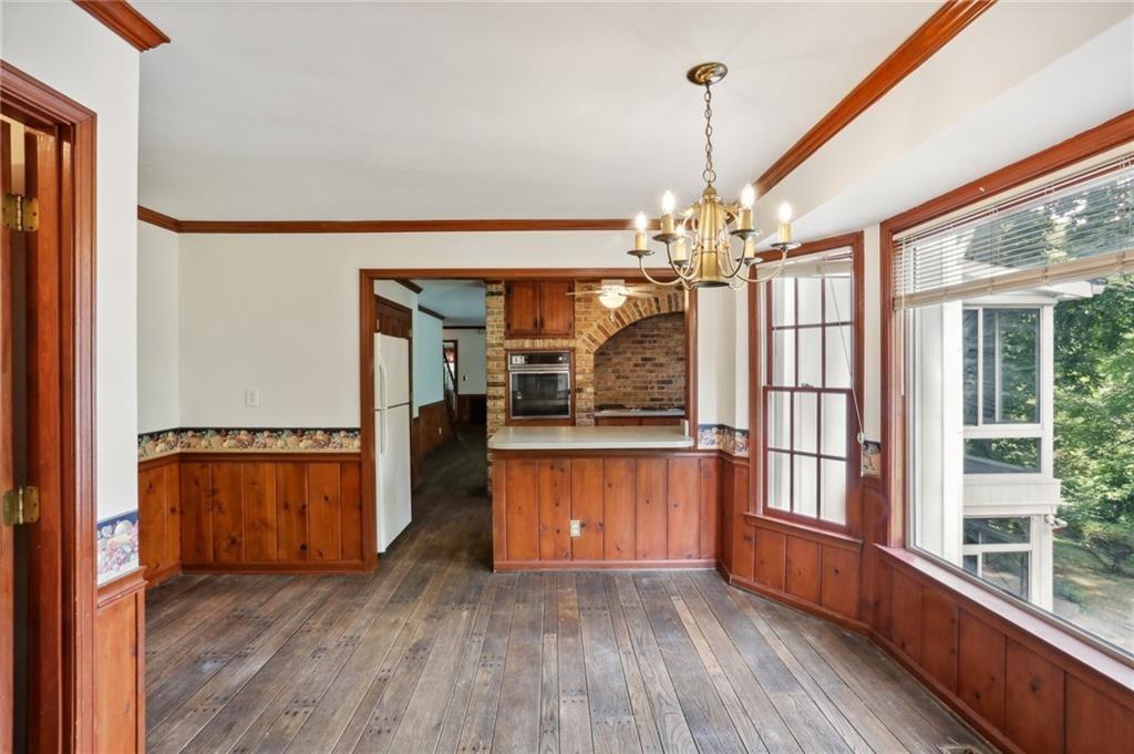 5622 Williamsburg Drive Northwest Norcross, GA 30093 - Photo 22 of 29 a view of a room with wooden floor and a window