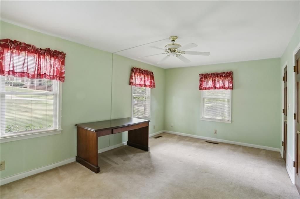 5622 Williamsburg Drive Northwest Norcross, GA 30093 - Photo 25 of 29 a view of an empty room with a window