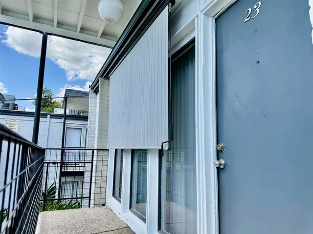 a view of a house with a swimming pool