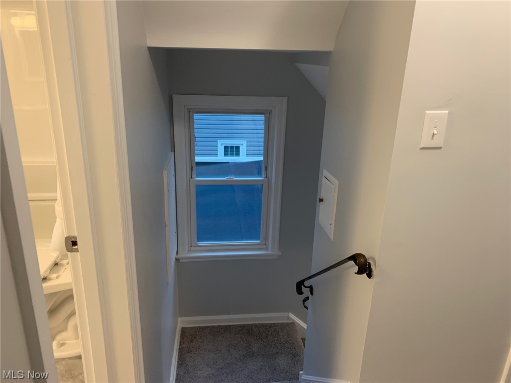 1456 Evanston Road Lyndhurst, OH 44124 - Photo 29 of 32 Stairway featuring dark carpet