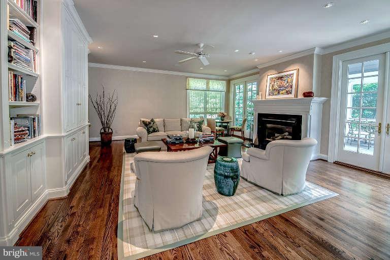 5511 Cornish Road Bethesda, MD 20814 - Photo 14 of 30 a living room with furniture and a fireplace