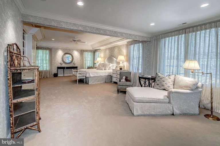 5511 Cornish Road Bethesda, MD 20814 - Photo 18 of 30 a living room with furniture and a flat screen tv