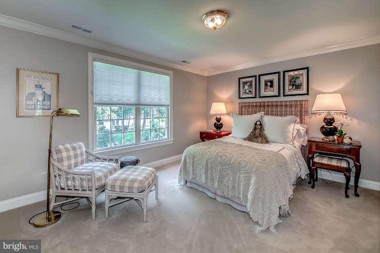 5511 Cornish Road Bethesda, MD 20814 - Photo 20 of 30 a bedroom with a bed and a window