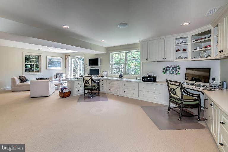 5511 Cornish Road Bethesda, MD 20814 - Photo 23 of 30 a living room with furniture and a fireplace