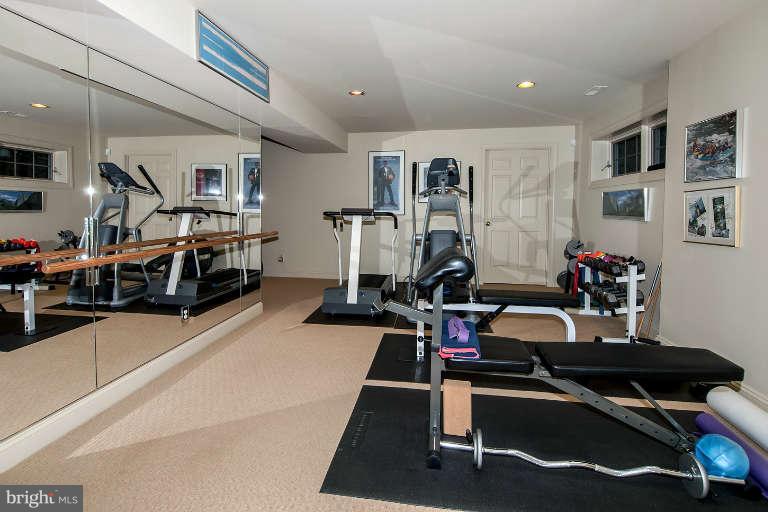 5511 Cornish Road Bethesda, MD 20814 - Photo 25 of 30 a view of a room with gym equipment