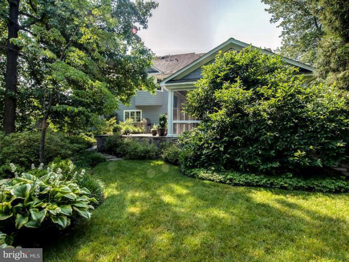 5511 Cornish Road Bethesda, MD 20814 - Photo 30 of 30 a front view of a house with garden