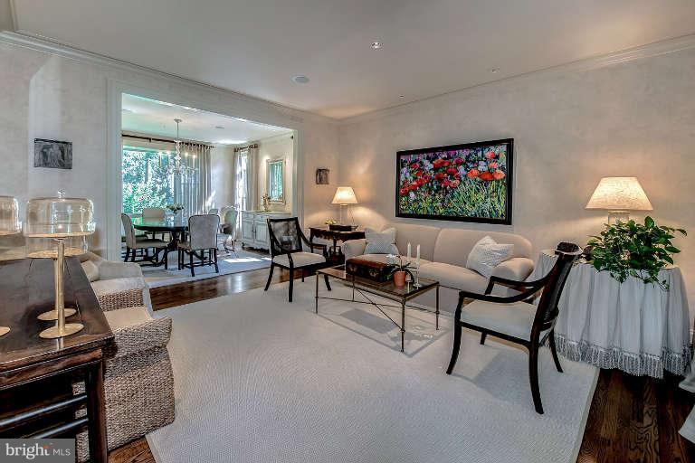 5511 Cornish Road Bethesda, MD 20814 - Photo 4 of 30 a living room with furniture and a flat screen tv