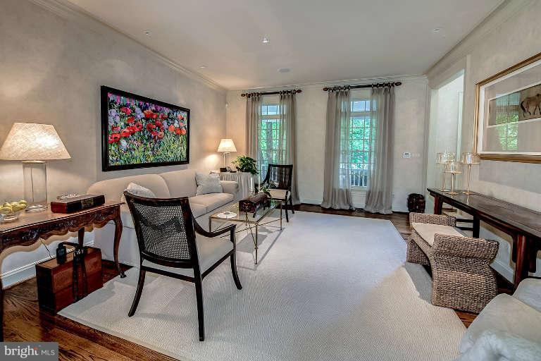 5511 Cornish Road Bethesda, MD 20814 - Photo 5 of 30 a living room with furniture and a flat screen tv