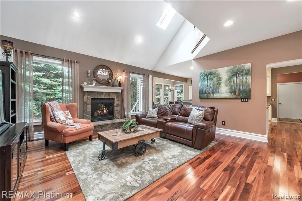 606 South Hacker Road Brighton, MI 48114 - Photo 7 of 42 Stunning Hardwood Floors Throughout