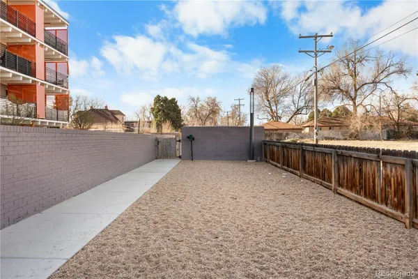 a view of balcony with wooden floor
