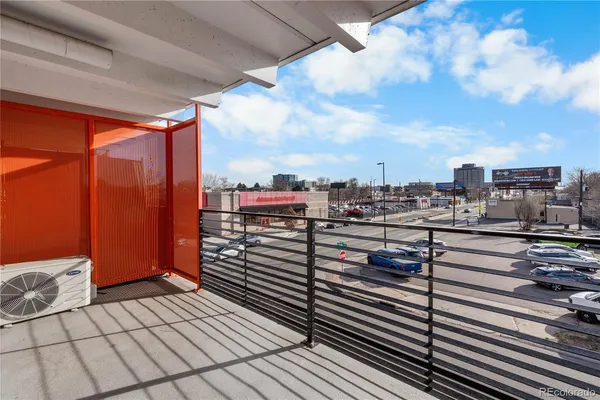 a view of a balcony with city view
