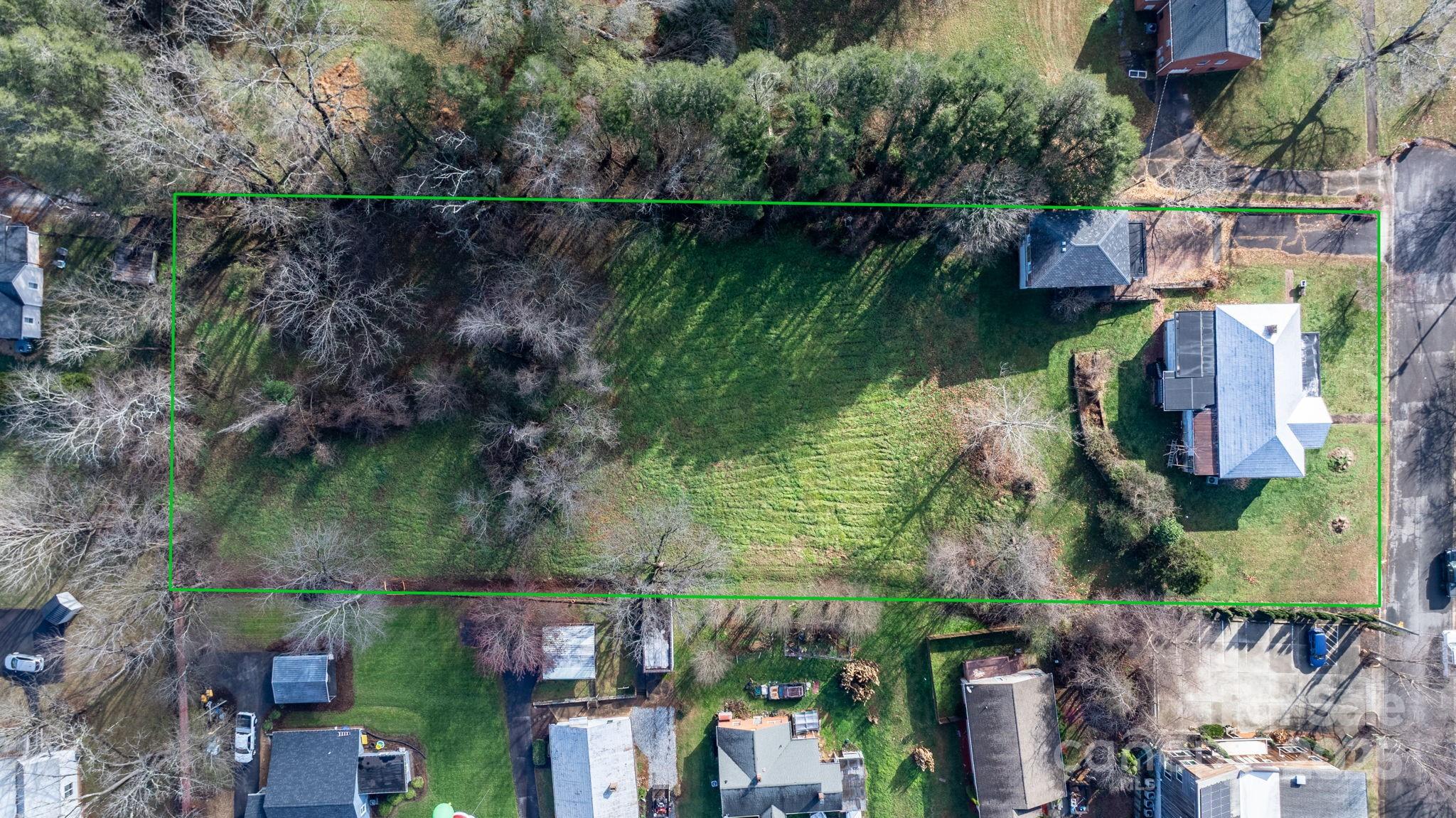 335 Eastview Street Morganton, NC 28655 - Photo 12 of 34 a aerial view of a house with a lake view