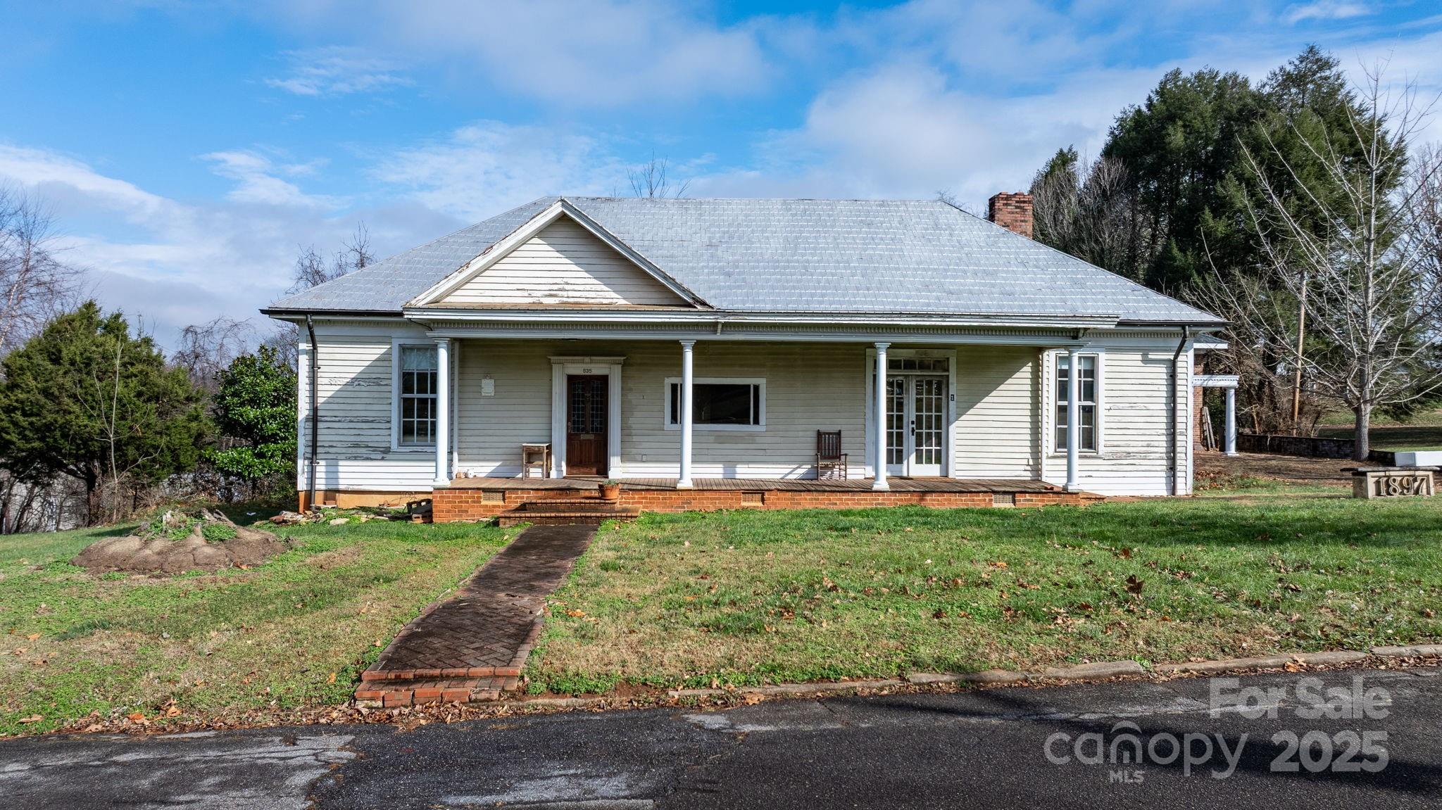 335 Eastview Street Morganton, NC 28655 - Photo 2 of 34 a front view of a house with yard patio and green space
