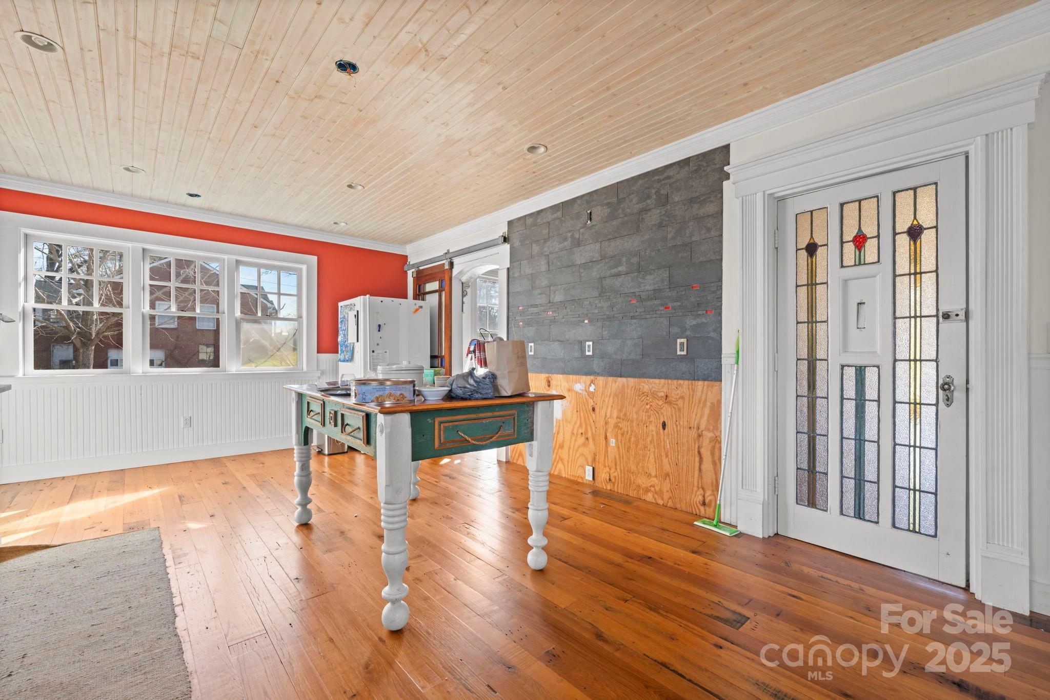 335 Eastview Street Morganton, NC 28655 - Photo 23 of 34 a living room with furniture and a table