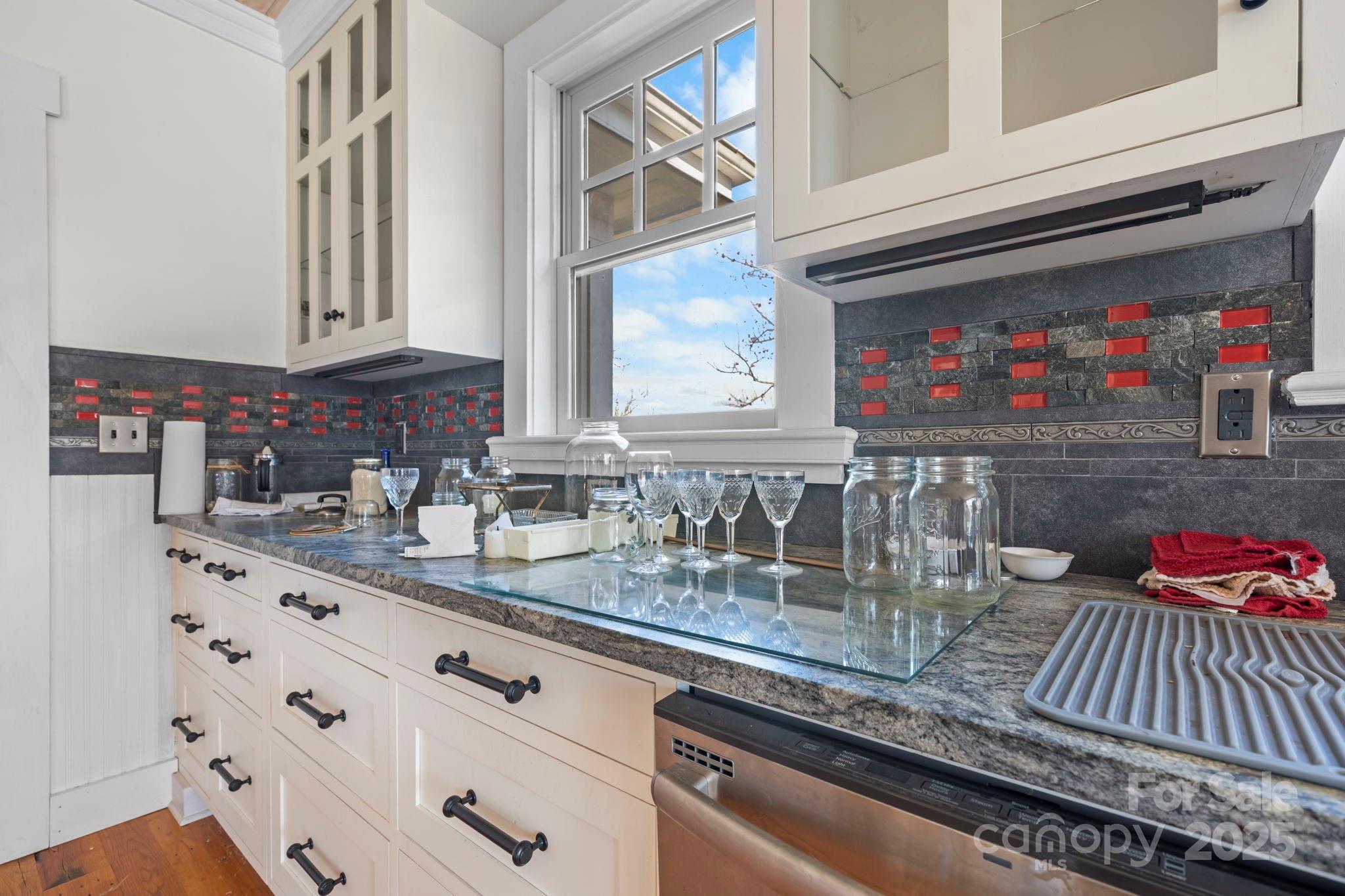 335 Eastview Street Morganton, NC 28655 - Photo 25 of 34 a kitchen with sink and cabinets
