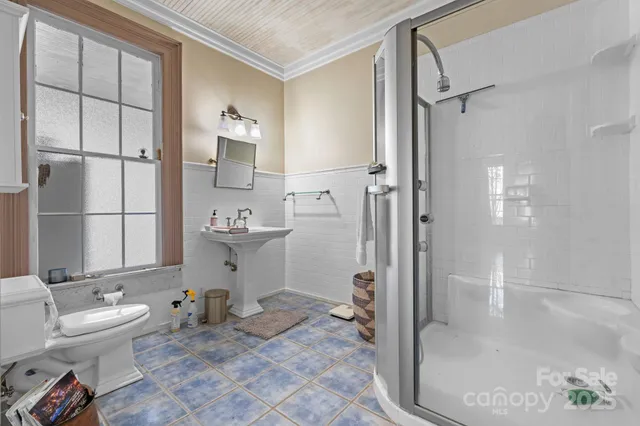 a view of a hallway with seating area