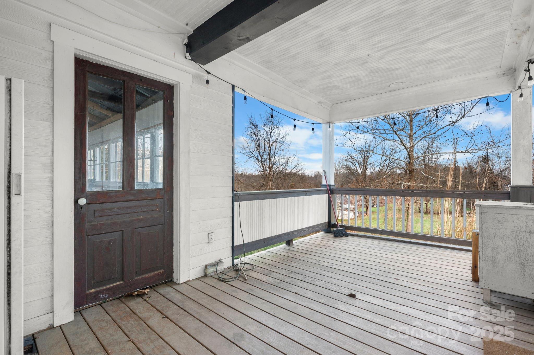 335 Eastview Street Morganton, NC 28655 - Photo 34 of 34 a view of a balcony with wooden floor