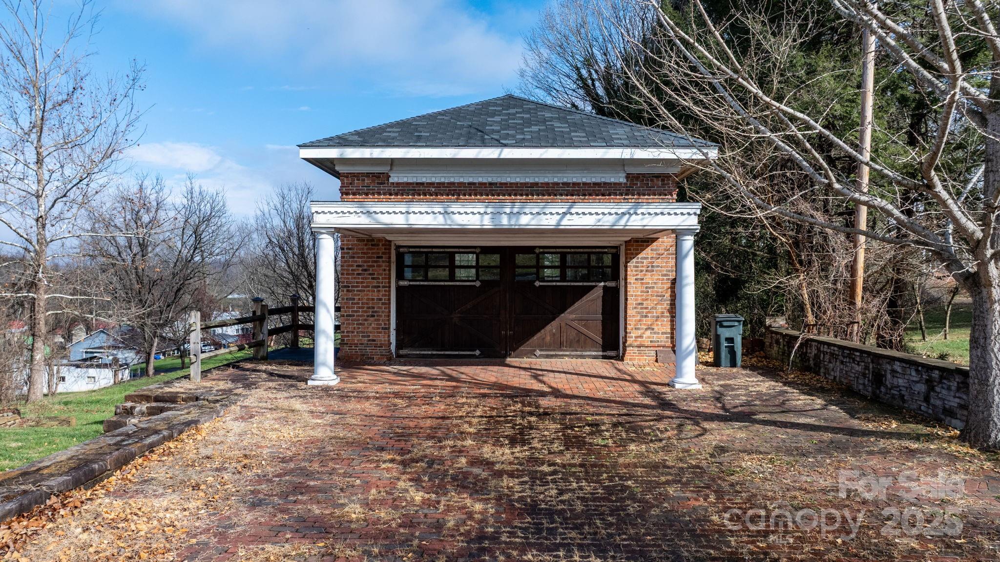 335 Eastview Street Morganton, NC 28655 - Photo 5 of 34 a front view of a house with a yard