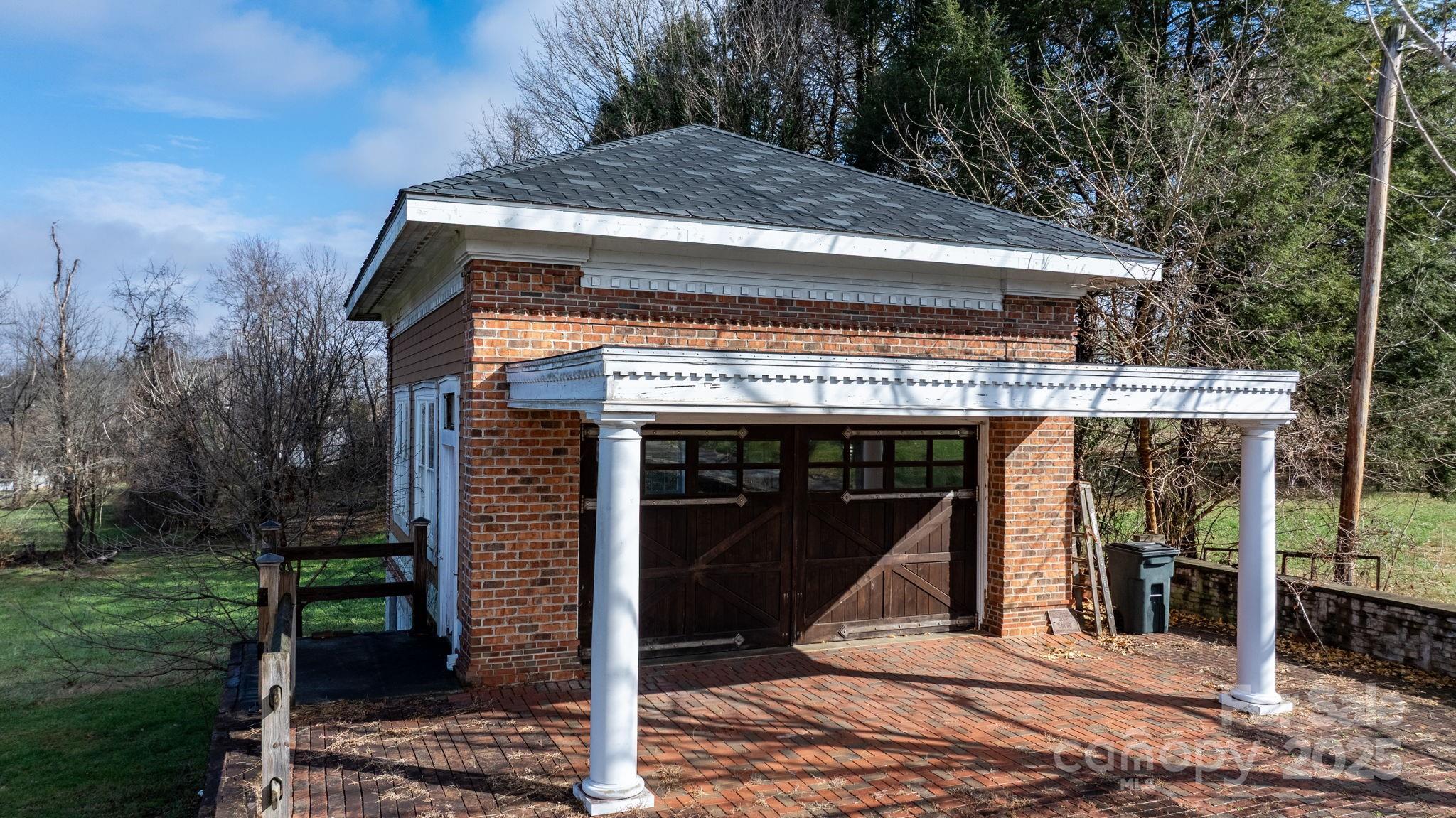 335 Eastview Street Morganton, NC 28655 - Photo 6 of 34 a view of a small house with backyard