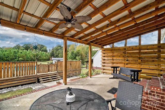 a view of a swimming pool with a terrace