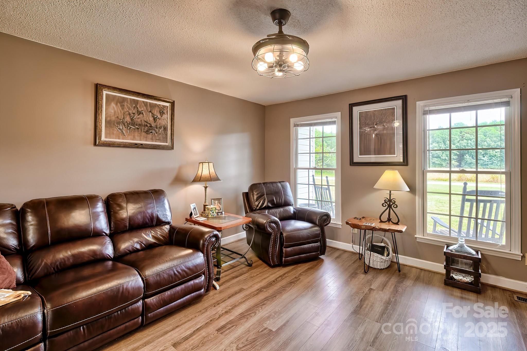 176 Griffin Road Pageland, SC 29728 - Photo 22 of 46 a living room with furniture and a large window
