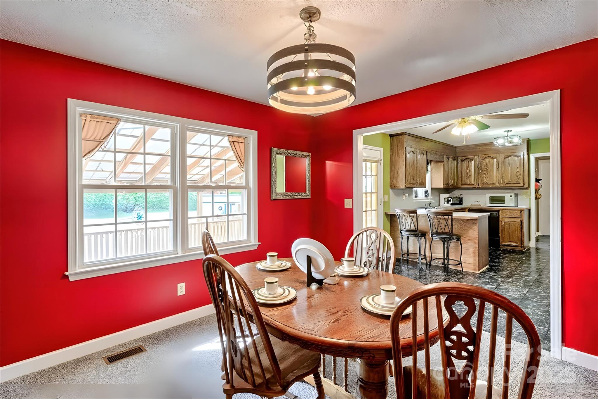 176 Griffin Road Pageland, SC 29728 - Photo 25 of 46 a view of a dining room with furniture and a window
