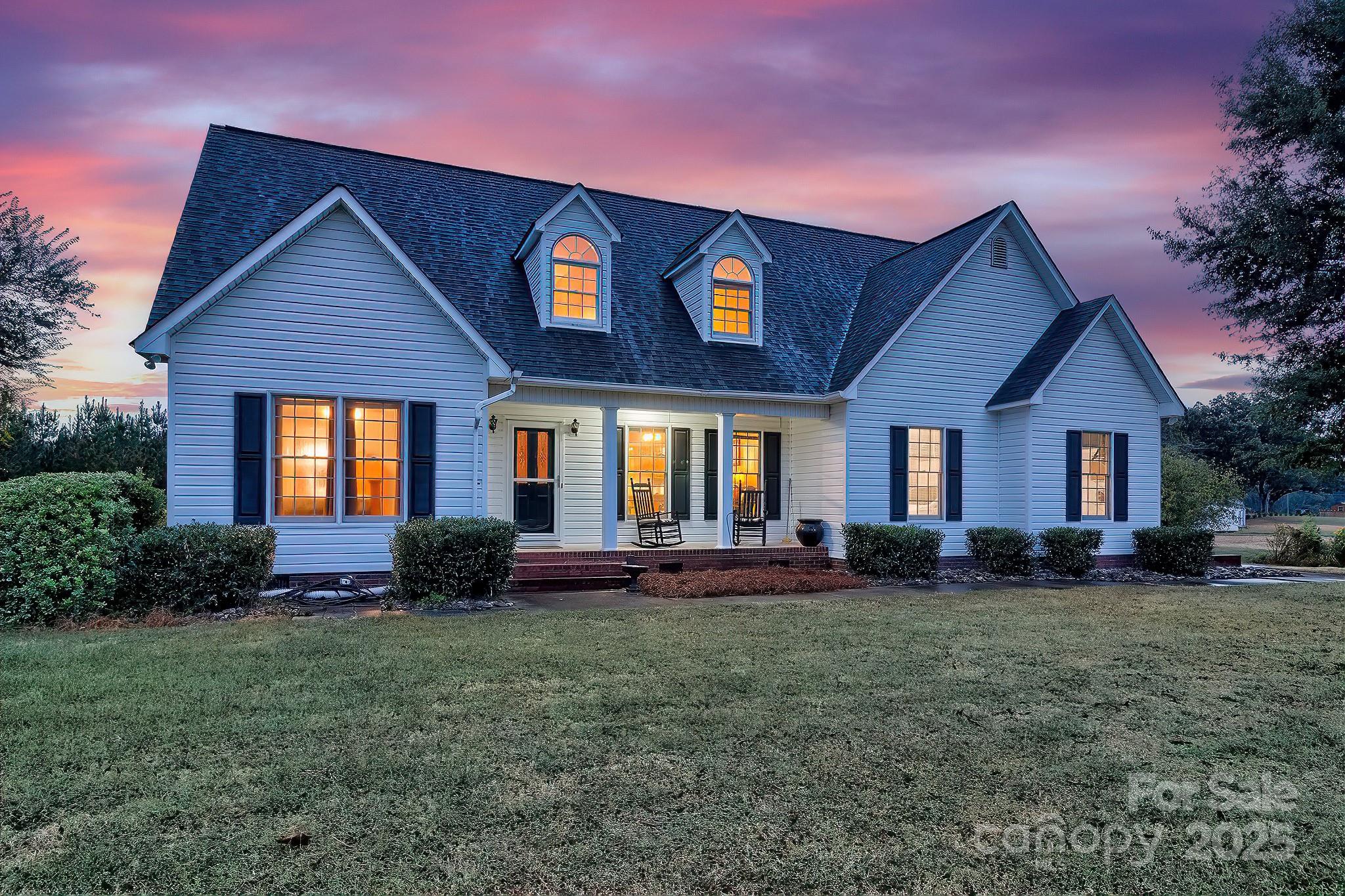 176 Griffin Road Pageland, SC 29728 - Photo 4 of 46 a front view of a house with a yard